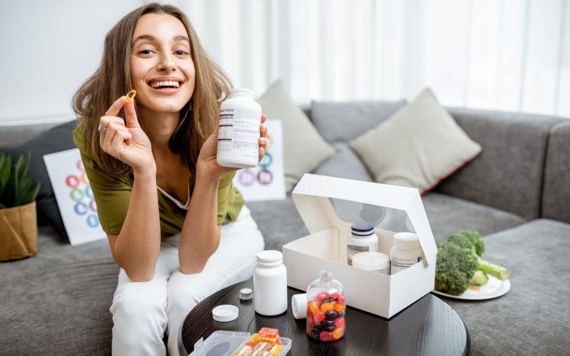 woman-with-nutritional-supplements-at-home.jpg